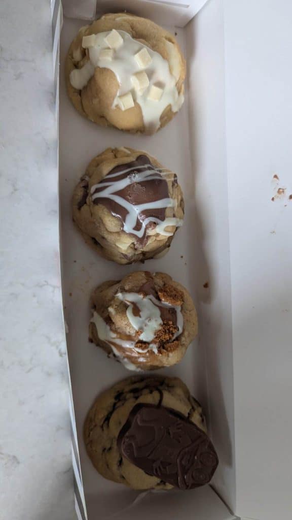 A box of freshly baked thick cookies from Just a Littlemore Cookie Company